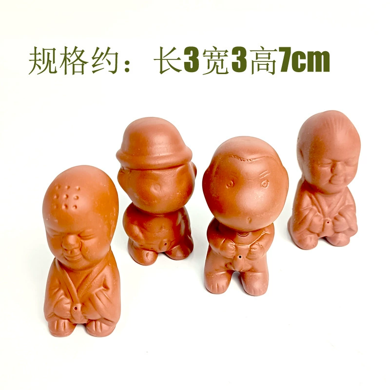 Фиолетовый чай с песком украшает высококачественный ребенок