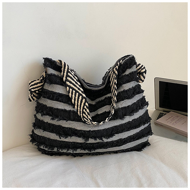 Bolso de denim de gran capacidad para mujeres 2026 verano nuevo estilo retro hacer vieja mochila de hombro de viaje bolsa de ocio