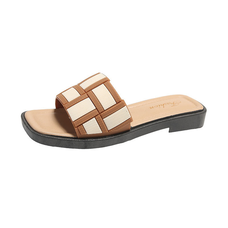 Zapatillas simples francesas para mujeres 2025 verano nuevo dedo desnudo de vacaciones de moda zapatillas al por mayor
