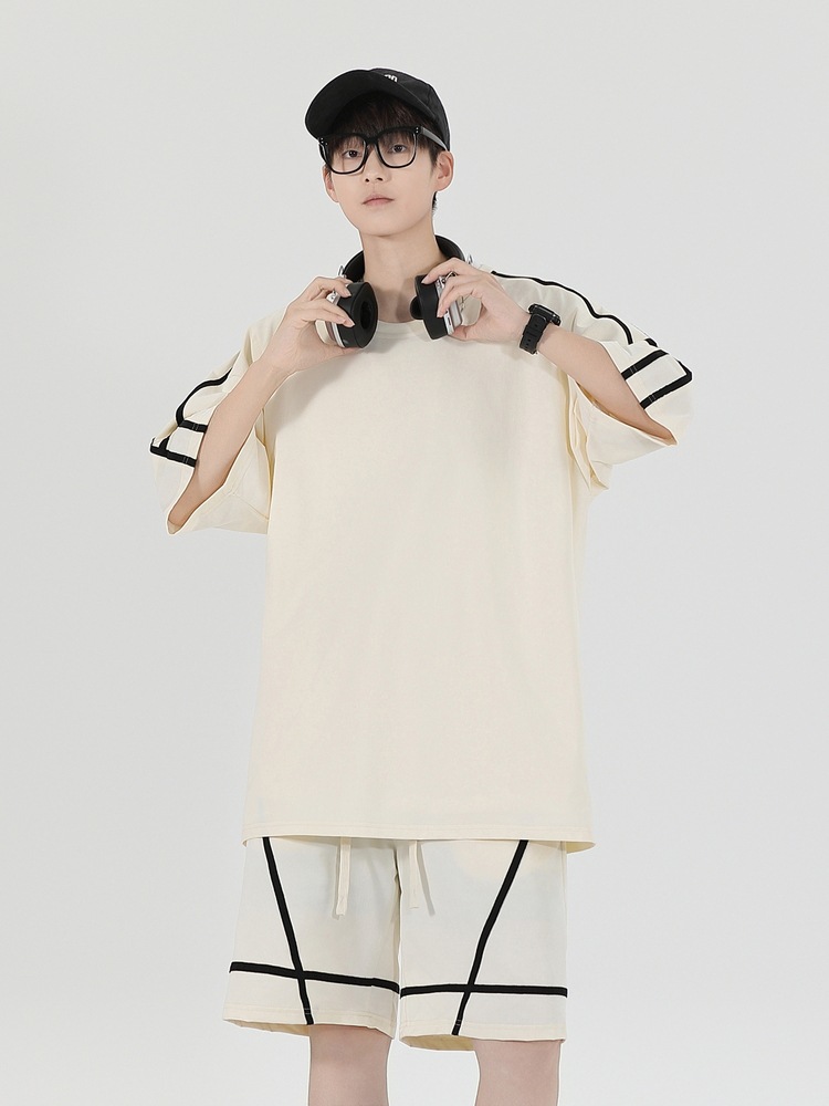 Fábrica de fuente personalizable logotipo de verano niño cuello redondo suelto camiseta de manga corta pantalones cortos trajes deportivos casuales para hombres