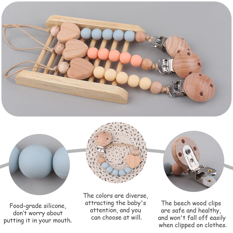 Nuevos suministros para bebés Beech clip anti-gota cadena calmante bebé cuentas de silicona mordida Beech corazón chupete cadena