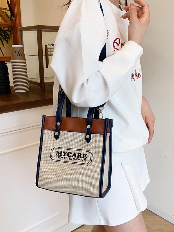 Bolso de mochila para mujeres 2025 nuevos productos transfronterizos de color de mano vertical tote de alta calidad bolsa de compras de transporte