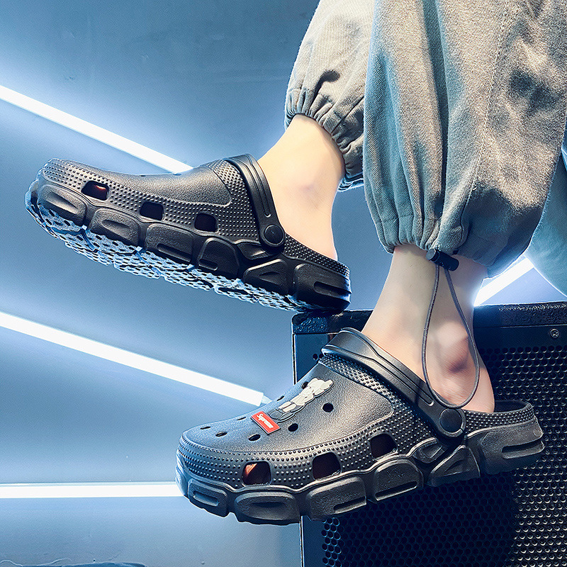 Zapatos con agujeros, zapatos casuales de verano nuevos para hombres, transpirables, huecos, ligeros, pisando mierda, dos zapatillas de Baotou vadeando en la playa