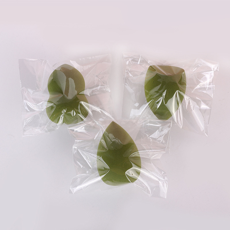 Embalaje independiente belleza huevo poliuretano maquillaje esponja polvo húmedo y seco soplo no-látex fábrica de bolas de maquillaje al por mayor