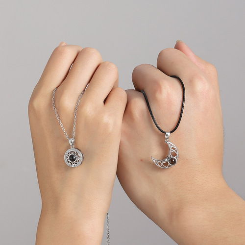 Cross-border personality sun and moon couple projection necklace male and female pair ins fashion 100 language magnetic pendant clavicle chain