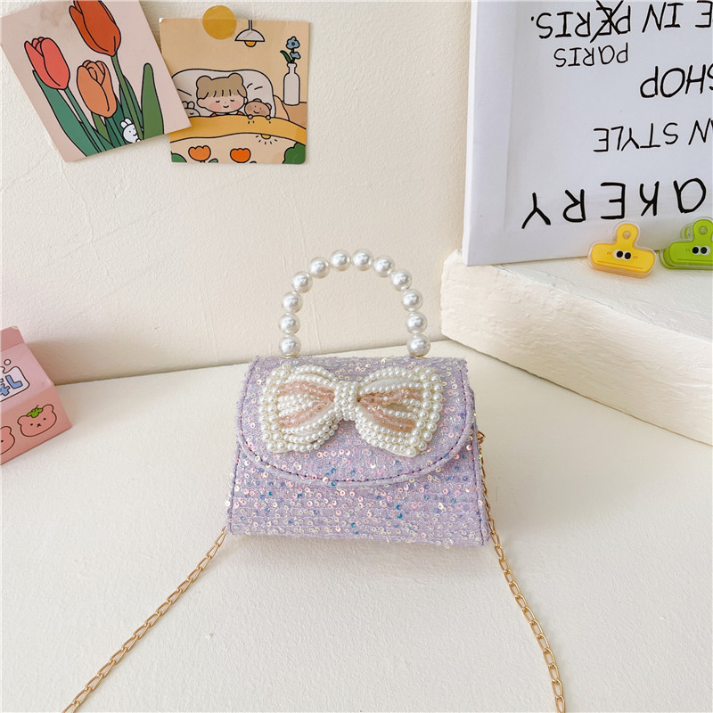 2025 nuevo pequeño viento perfumado bolso de niños princesa viento beaded bolso de cambio de mano bolso de hombro de moda bolso de cadena