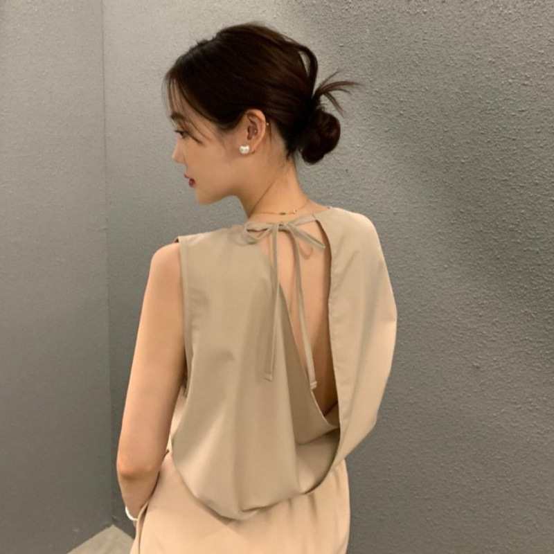 New Summer Style Sleeveless Shirt with Cutout Back and Tie-Up Design for Women, Slimming and Elegant Top, Sizes Updated and Ready for Shipment New Summer Style Sleeveless Shirt with Cutout Back and Tie-Up Design for Women, Slimming and Elegant Top, Sizes Updated and Ready for Shipment