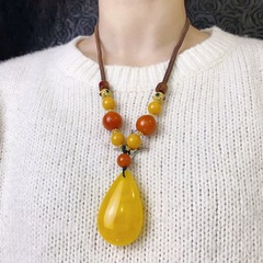 レトロな水滴のミツロウのペンダント