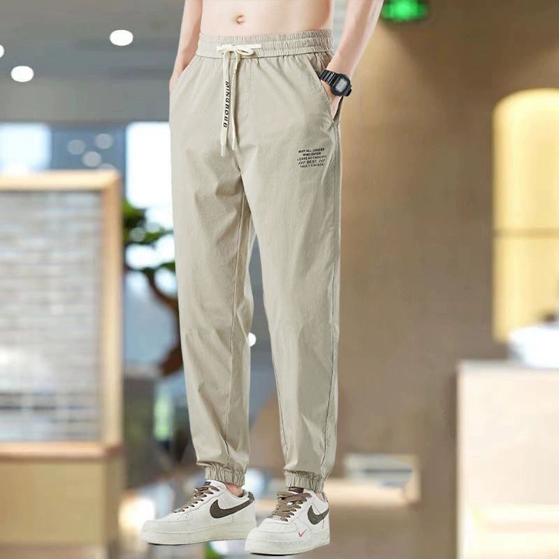 2024 новые повседневные брюки мужские летние тонкие девятиукороченные брюки трендовые спортивные корейские дикие брюки с ножками мужские брюки
