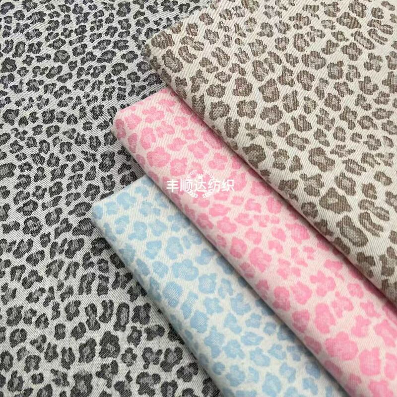 Colorful textured leopard print denim fabric for pants, jackets, skirts, bags, hats, and clothing wholesale