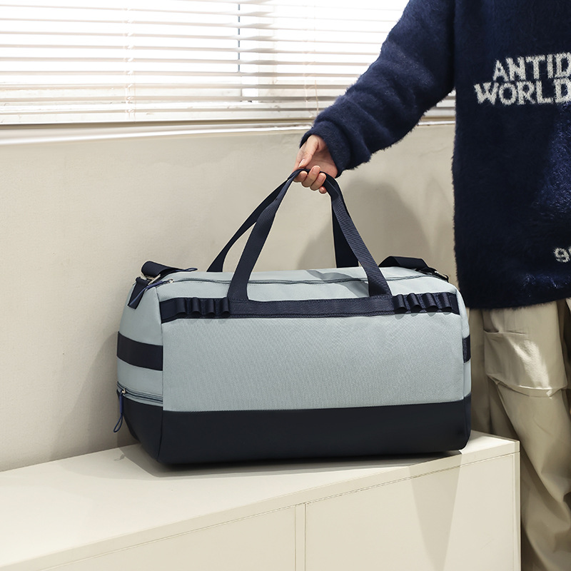 2025 bolsas de viaje portátiles simples de color de gran capacidad bolsas deportivas de ocio para hombres bolsas de ropa de cama inclinadas ligeras para mujeres