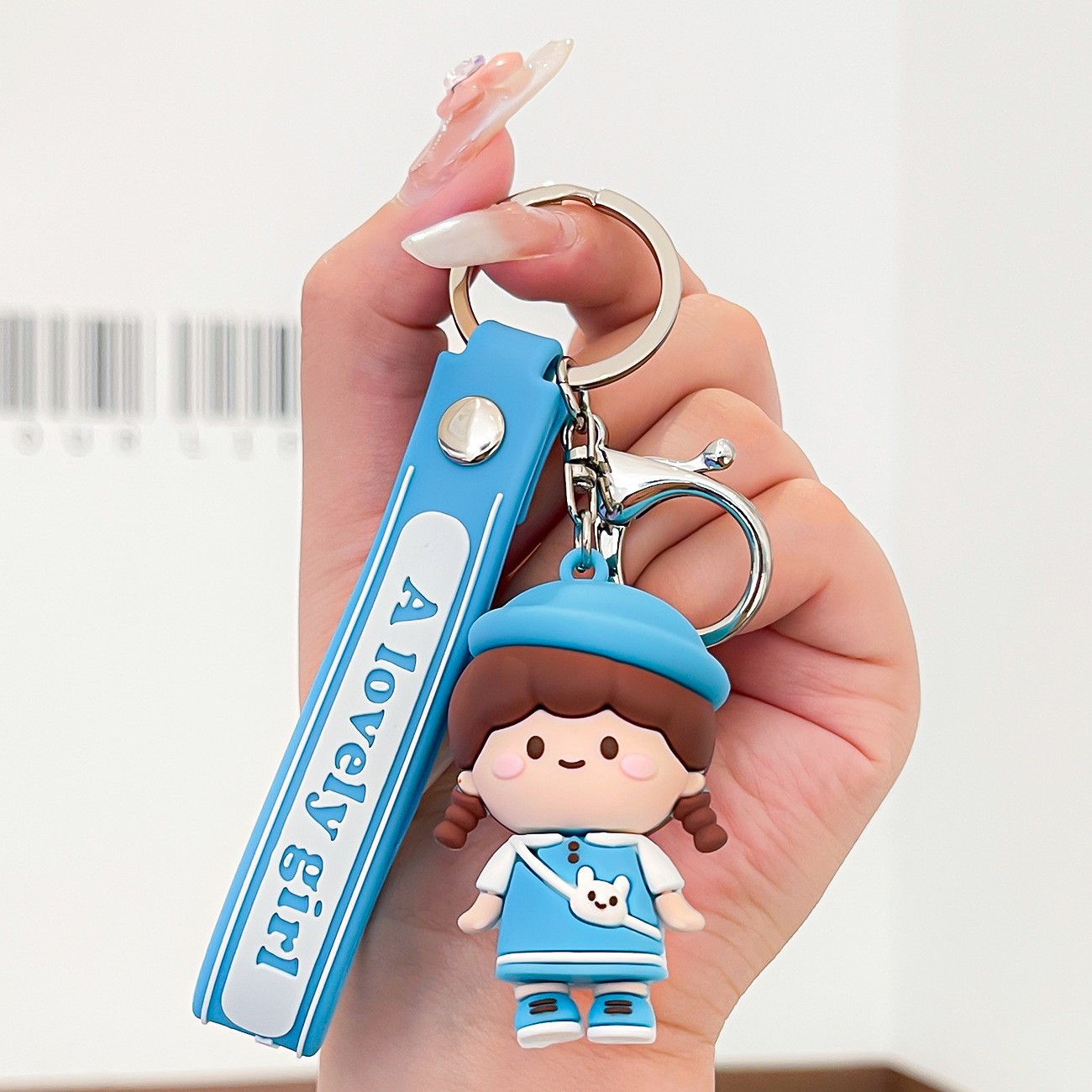 Venta directa de fábrica llavero colgante pequeño muñeca tridimensional llavero de coche mochila escolar colgante puesto al por mayor productos pequeños