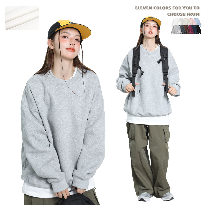 ANSアメリカの重いポンドの純色の丸首の衛衣の男女の春と秋のファッションの札のゆったりしている内は底のプルオーバーの上着を掛けます。