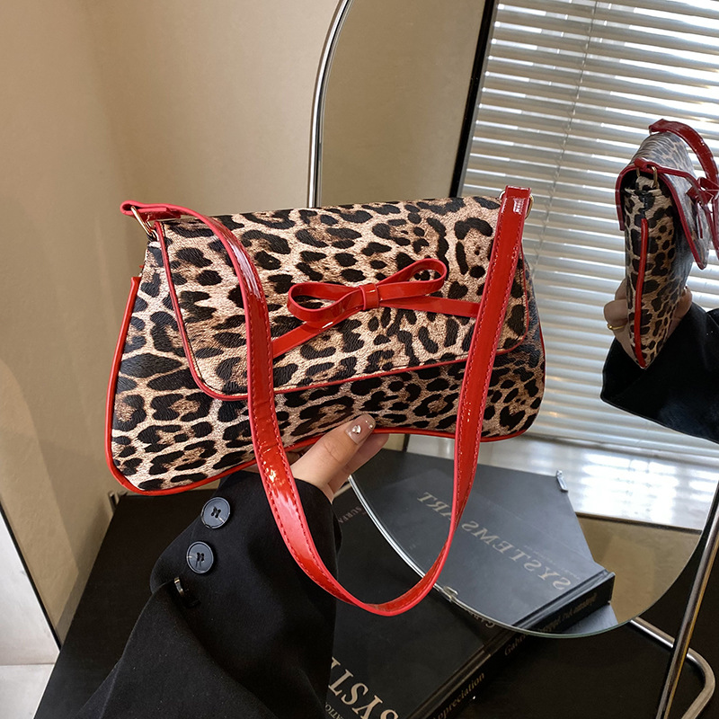 Bolso de leopardo nuevo estilo retro coreano arco de moda PU estilo exterior bolso de hombro axilar