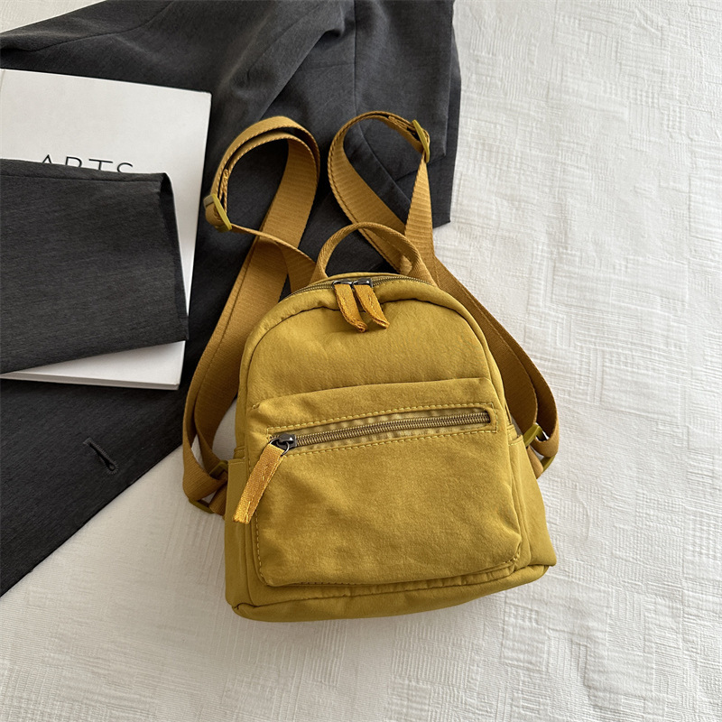 Mochila mini 2026, estilo japonés y coreano, informal, de lona, para estudiantes, de color sólido, versátil, para tabletas