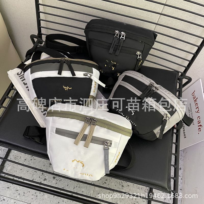 男性と女性のクロスボディ携帯電話バッグ 2025 新しいナイロンバックパック旅行外出刺繍コントラストカラー外国風ファッショントレンディなバッグ|undefined