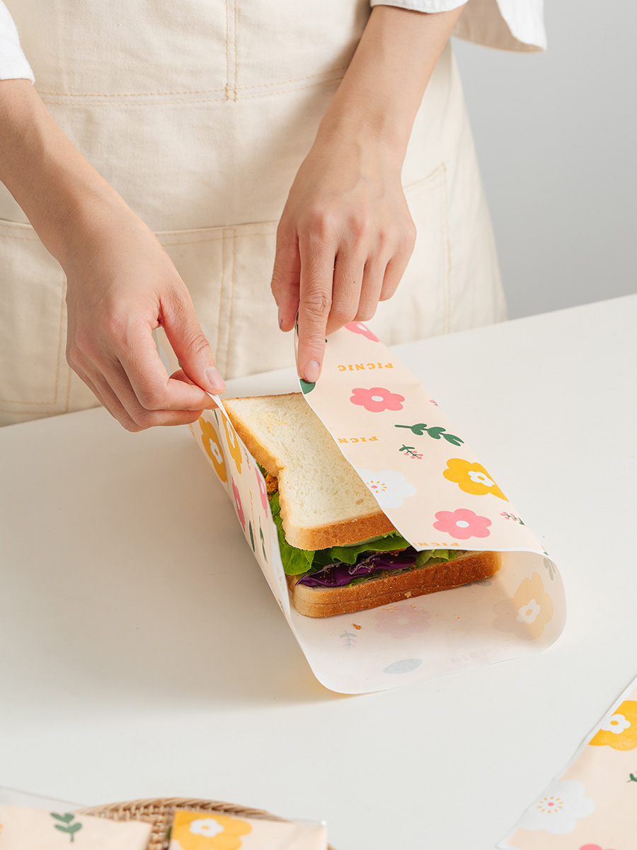 Papel de embalaje de sándwich impermeable a prueba de agua a prueba de aceite de grado alimenticio papel de película de limpieza de hamburguesas perros calientes mano agarrar pastel papel de embalaje comercial doméstico