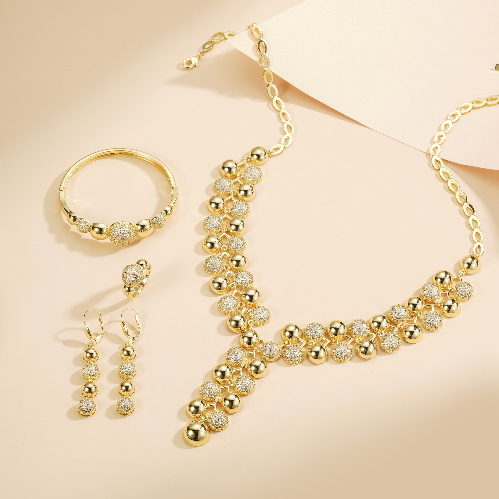 Diseño de moda de alta gama, cuentas de diamante, collares, pendientes, pulseras, anillos, 14K, cuatro piezas, conjunto de bronce