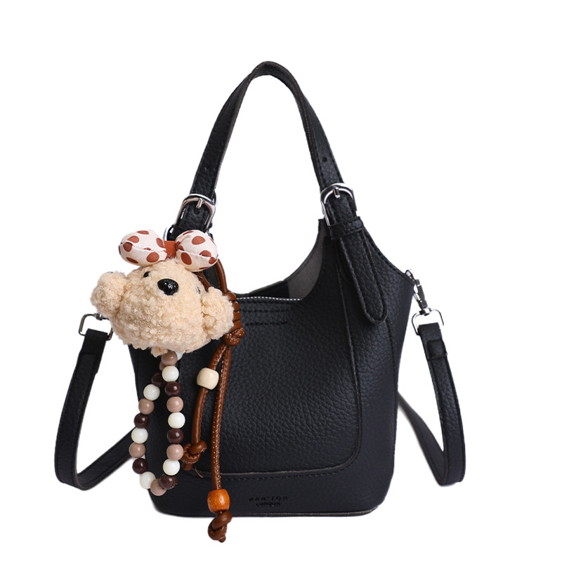 2026 nueva moda versátil cesta de verduras portátil bolso de cubo de agua de alta calidad litchi patrón ligero bolso de lujo bolso de mochila