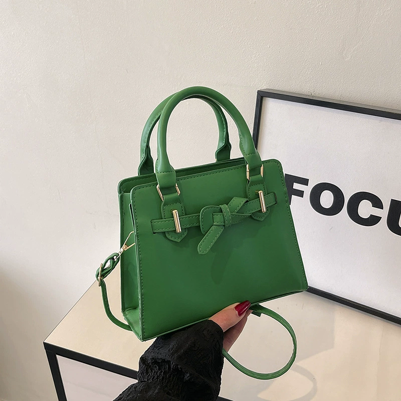 Capacious classic handheld one-shoulder bag with bow for leisure