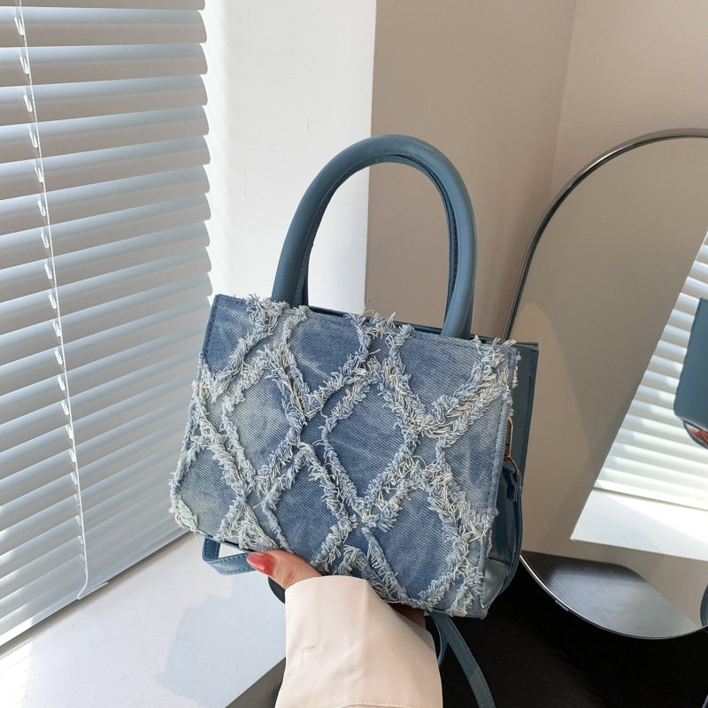 Bolso de mano de viaje simple verano 2024 nuevo estilo simple bolso de viaje de moda simple bolso de hombro personalidad simple mochila de moda