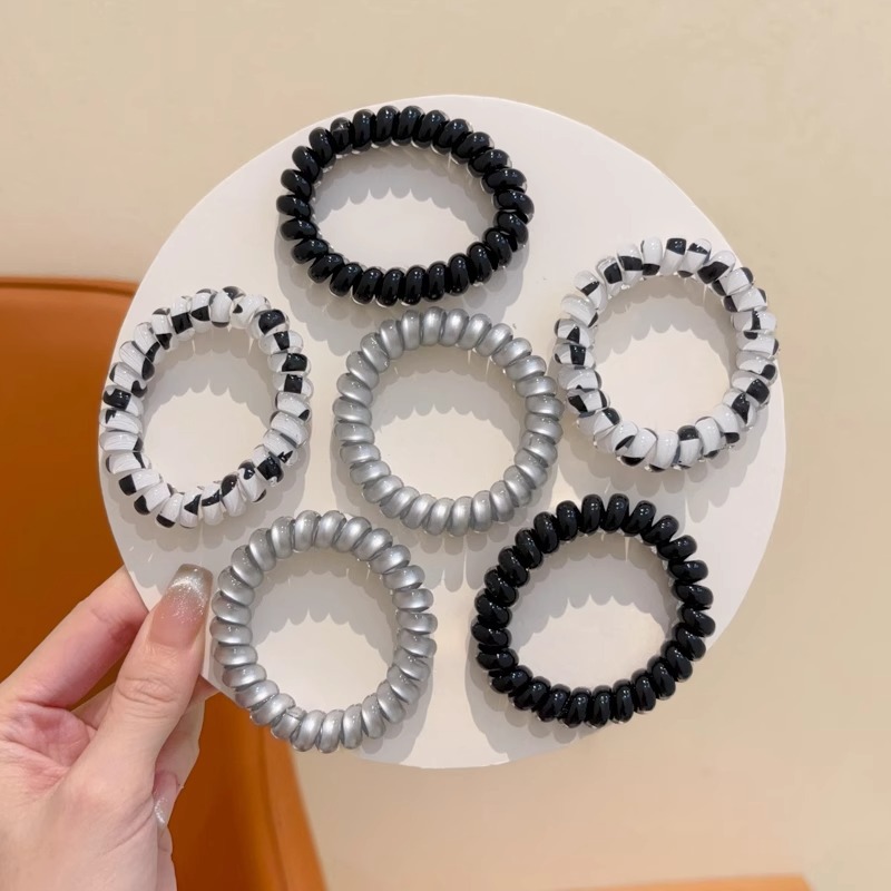Anillo de cabello coreano de ondas para niños línea telefónica de alta elasticidad simple 2024 nueva banda de goma de cabello para niñas no lastimas
