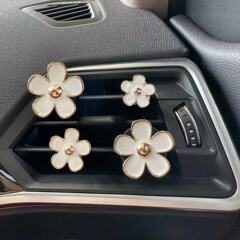 国境を越えた人気の車のエアベントアロマセラピークリップ合金デイジーフラワーセット車のエアベント装飾フレグランスクリップ