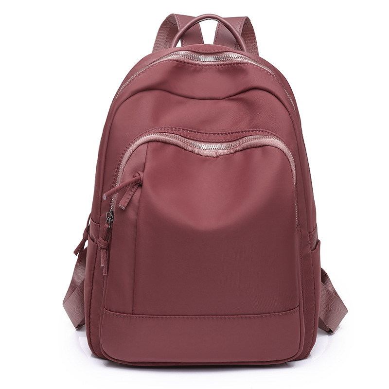 Fuente de origen 2023 nueva mochila Oxford para mujer coreana, mochila de viaje al aire libre de moda simple y versátil