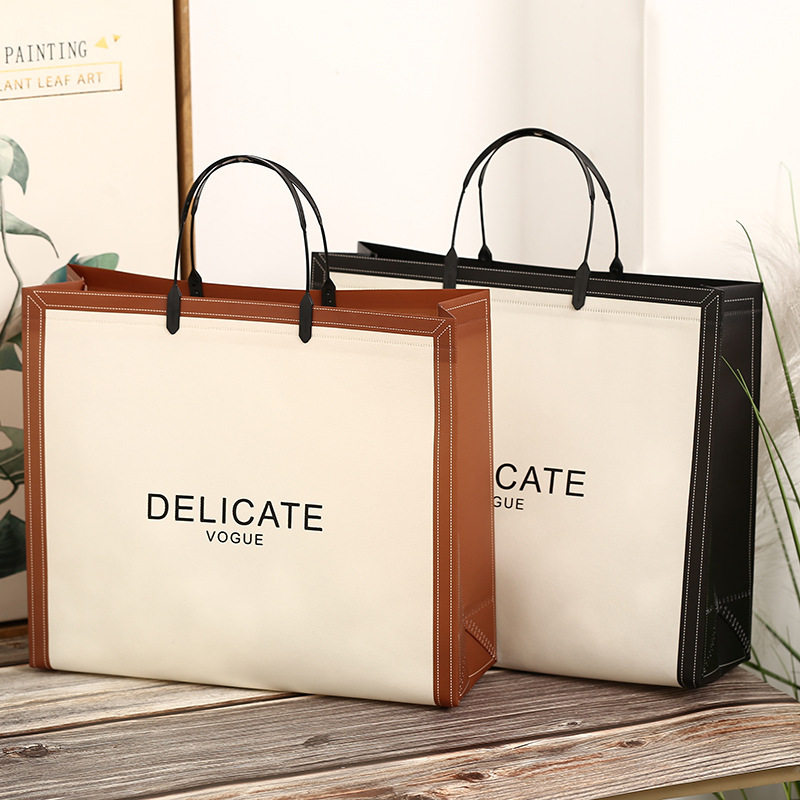 定制无纺布高档加厚防水袋子服装塑料手提购物袋衣服包装袋子定做