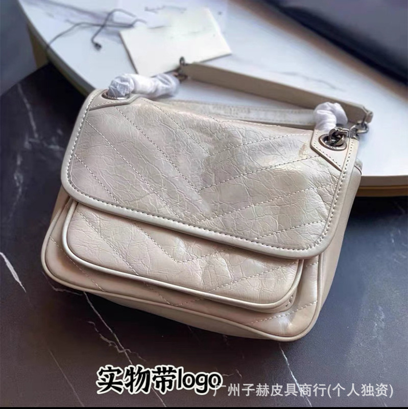元の工場の高品質の楊林のnikiの中号の郵便番号は本革のチェーンの放浪のカバンを包んで肩を斜めに掛けてわきの下の女性のカバンを掛けます。|undefined