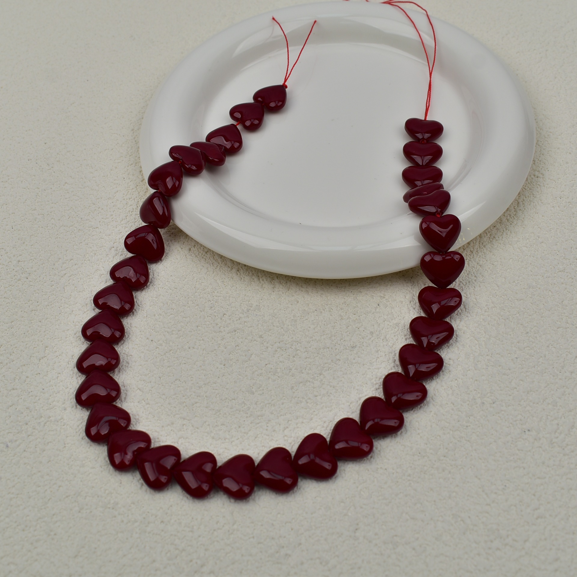 Quality glass beads heart-shaped