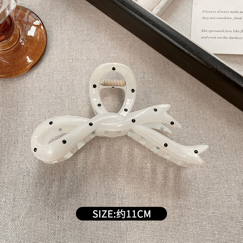 White polka dot ribbon