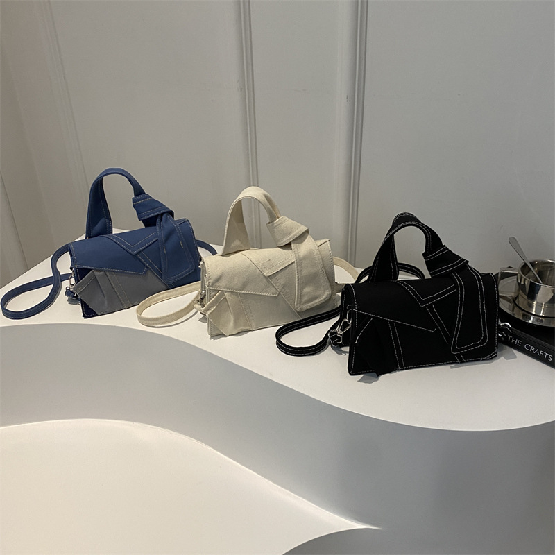 Bolso de moda jeans empalmado, bolso de mujer empalmado, bolso de hombro casual, sensación de estilo extranjero este año, nuevo bolso de mano