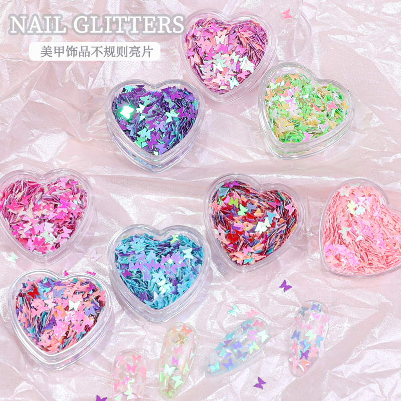 Arte de uñas Aurora mariposa lentejuelas irregulares láser corazón lentejuelas brillo de uñas color mágico accesorios de joyería en caja