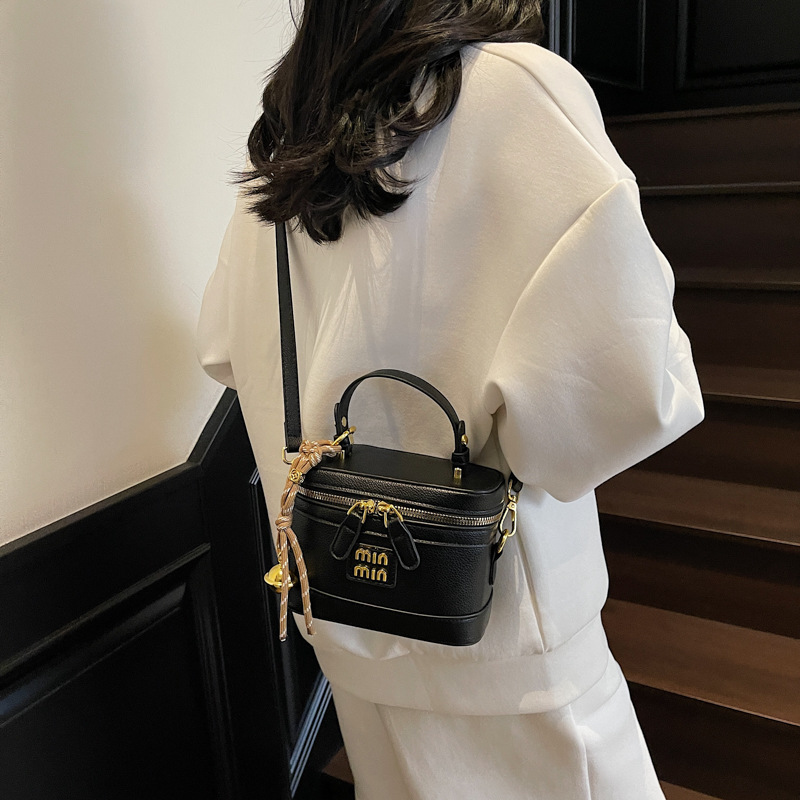 Caja portátil de alta gama transfronteriza pequeña bolsa cuadrada mujer 2025 nueva moda coreana bolso de mensajero de un solo hombro