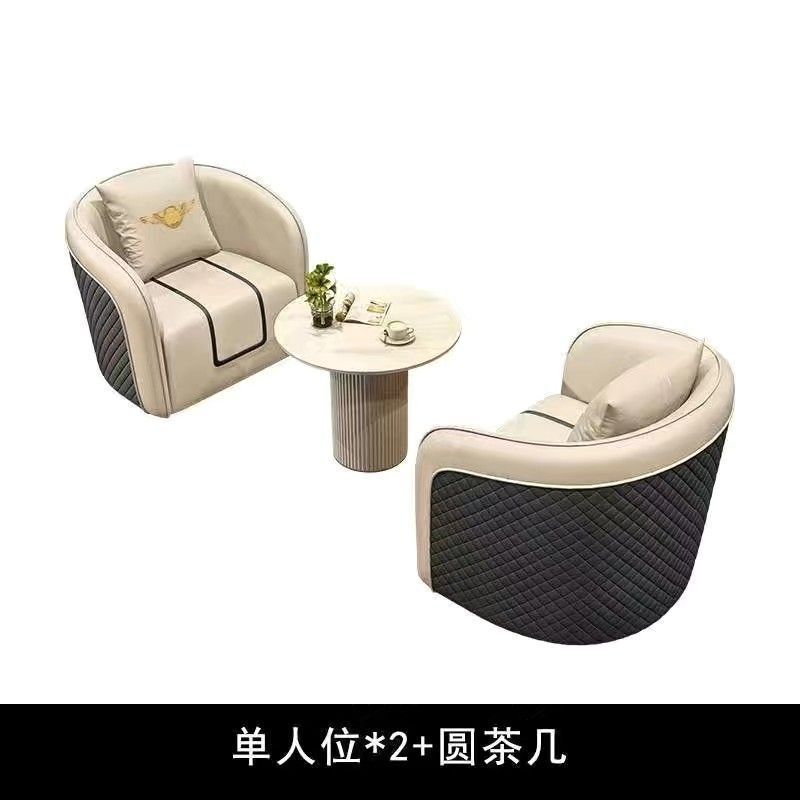 現代のシンプルなホテルの商談会の喫茶店はソファーのテーブルの椅子を接待します。|undefined