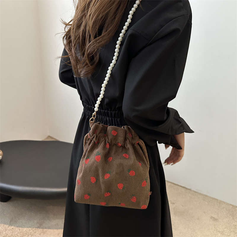 Dulce y lindo bolso de cubo de este año, popular cinturón de cuentas de velcro, exquisito estilo extranjero, bolso de hombro de mujer.