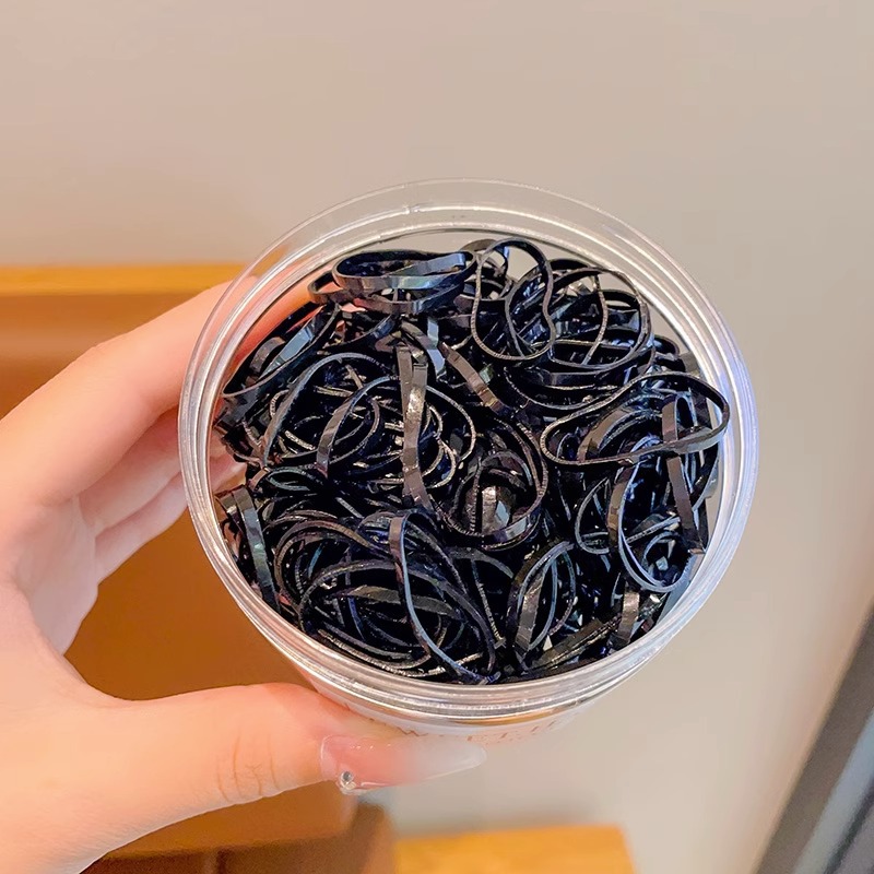 El cabello del bebé está atado, la banda elástica alta, la banda elástica desechable, la trompeta de color para niños no daña el cabello, la banda elástica pequeña