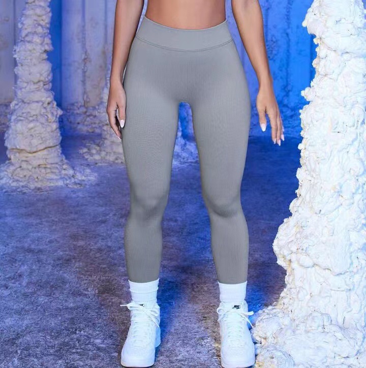 Europeos y estadounidenses de hilo sin pierna trajes deportivos de manga larga chaleco de yoga en una sola pieza pantalones de acondicionamiento de la mujer
