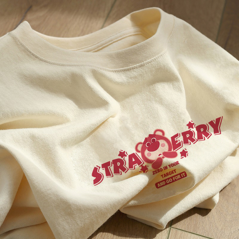 アメリカの純綿の肩の半袖のtシャツの女性2025新型の夏の大きいサイズはゆったりしています。
