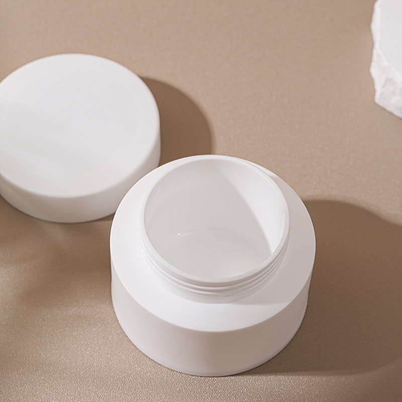 Fábrica al contado 30g / 50g / 80g caja de crema portátil PP material caja de crema exfoliante caja de embalaje cosmético