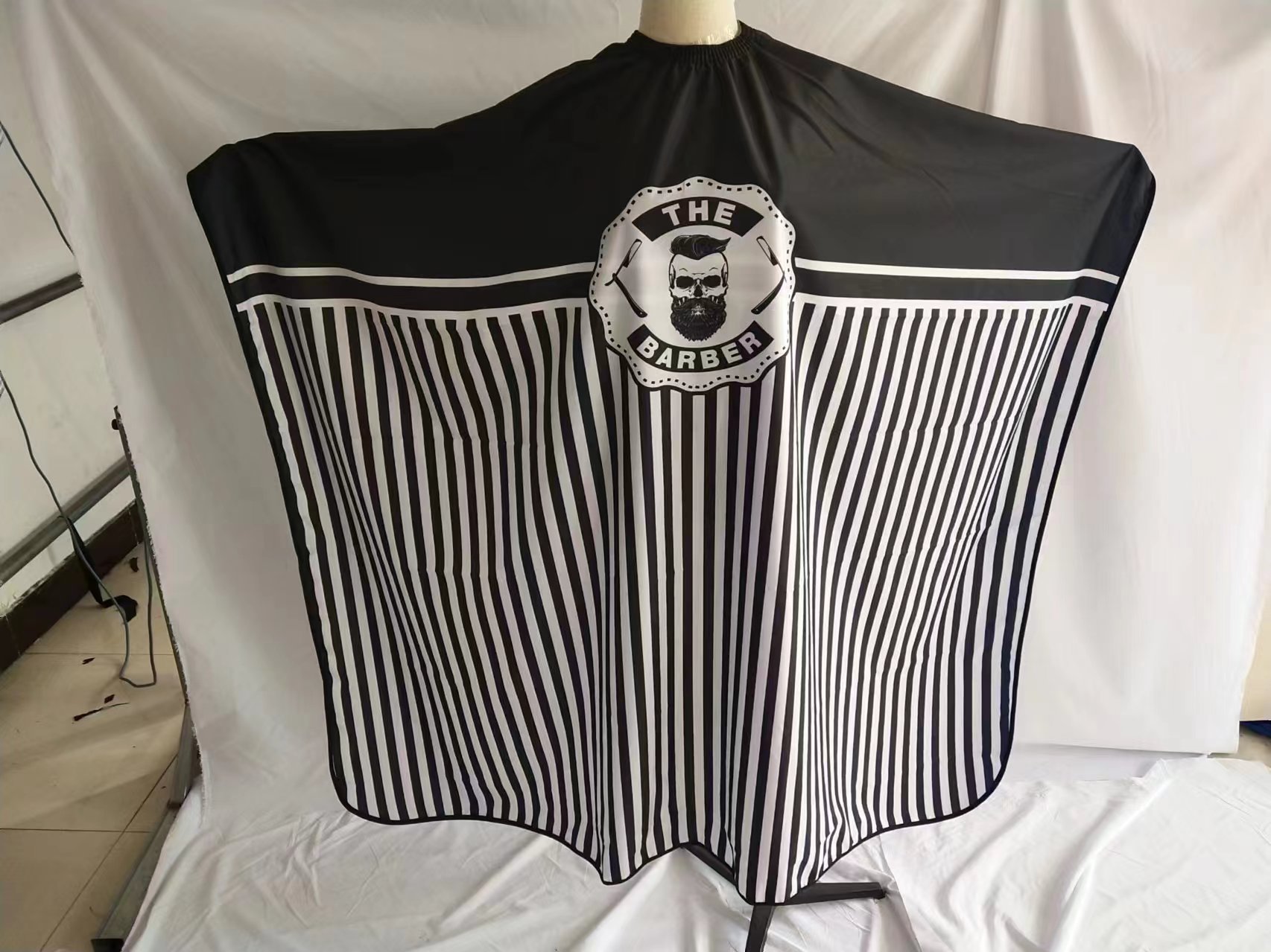 Fabricante spot salón peluquería corte de pelo tela antiadherente estilo europeo y americano simple tinta herramientas de corte de pelo tendencia