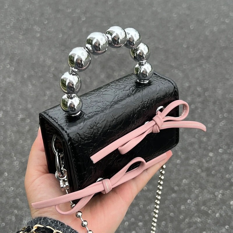Niche designer bag bow mini chain earphone bag cute sweet portable shoulder messenger bag for women