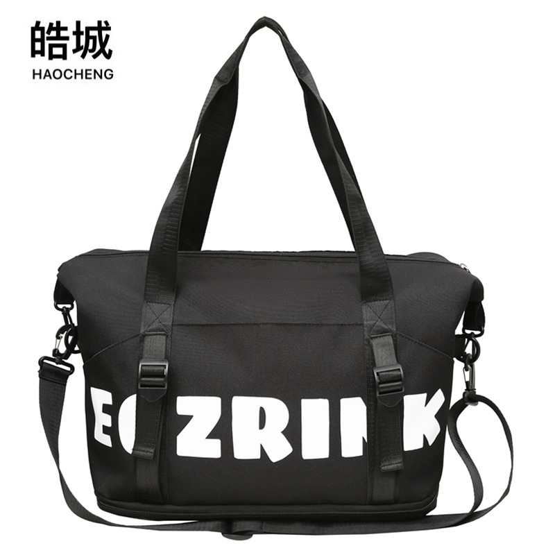 Comercio exterior al por mayor nueva bolsa de viaje de gran capacidad de separación seca y húmeda moda femenina color contraste viaje al aire libre almacenamiento bolsa de equipaje