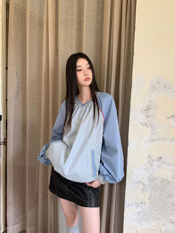 スウェットの女性のデザイン感の小さい丸首の頭は肩の長袖のゆったりしています。|undefined