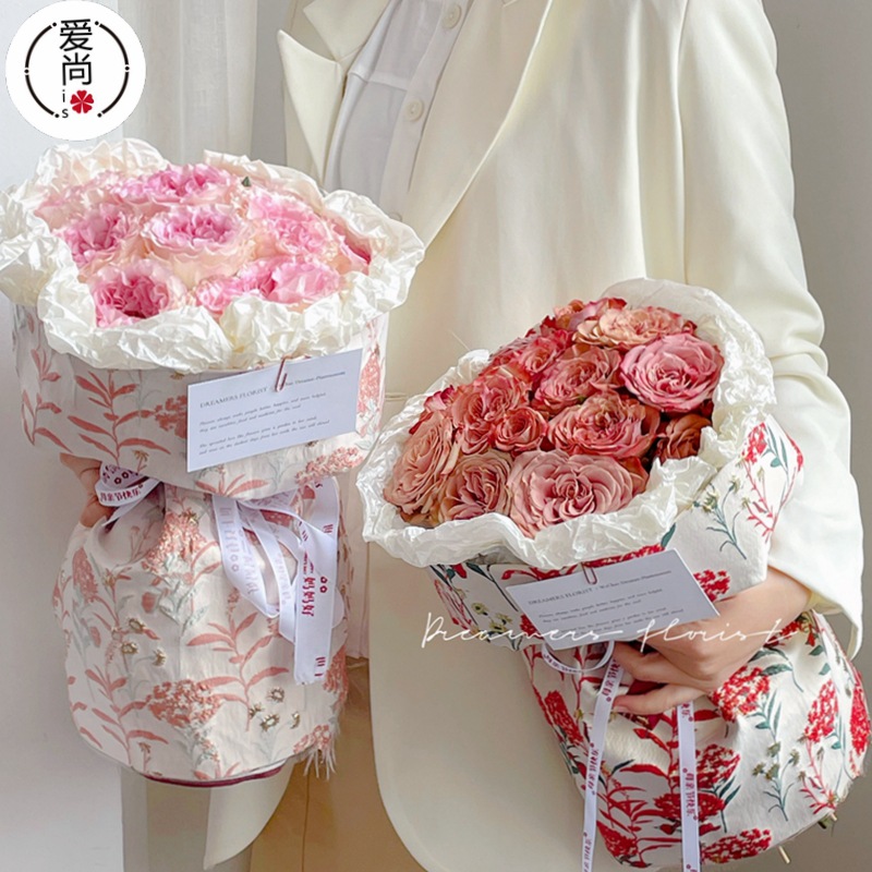 粉色提花布艺面料鲜花花束绣花小香风包装布包花布花店diy材料