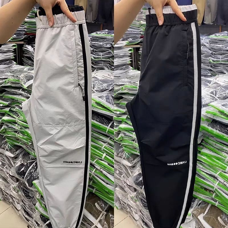 Trendy Marke Color Blocking Design Casual für Männer 2024 dünner Stil Harem modische vielseitige Neun-Punkt-Sporthose_voghion.com