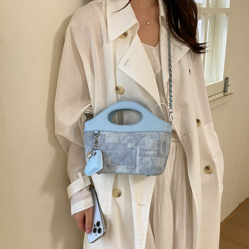Bolsa de cadena de diamante diaria bolsa de cuero suave de mujer 2026 nuevo verano relajado bolsa de hombro inclinada para viajar