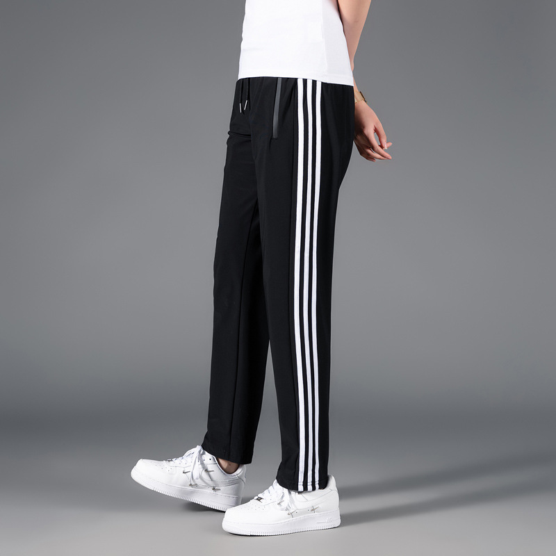 Tres barras pantalones de seda de hielo de verano Pantalones casuales deportivos elásticos de secado rápido para hombres sueltos más tamaño