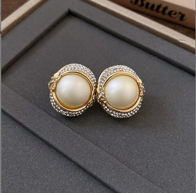 Pendientes de camelia de simulación de aguja de plata Pendientes elegantes retro francés Pendientes de todo fósforo de moda personalizada